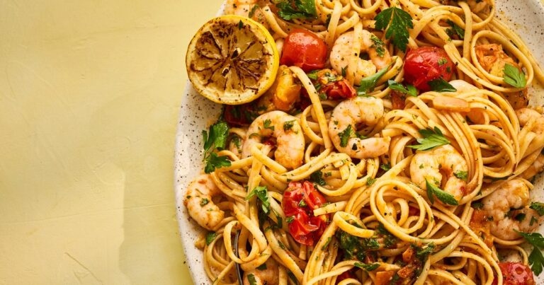 Shares of plates linguine with shrimp piles, the best burst cherry tomatoes and charred lemon