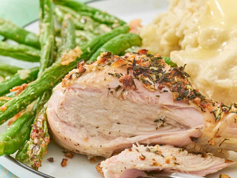 Crunchy chicken and garlic cup potatoes, everything on a sheet metal pan