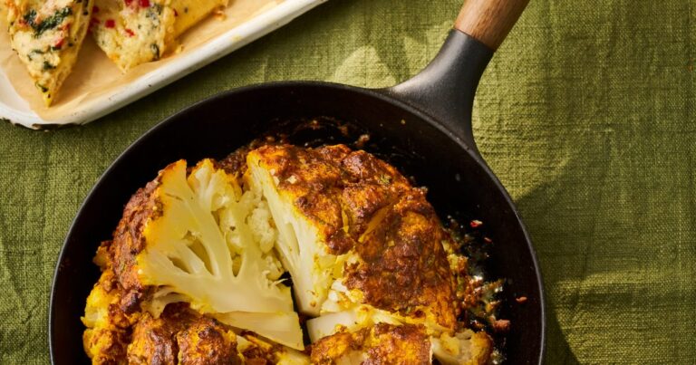 Whole cauliflower Tikka Masala with kitschy Naans